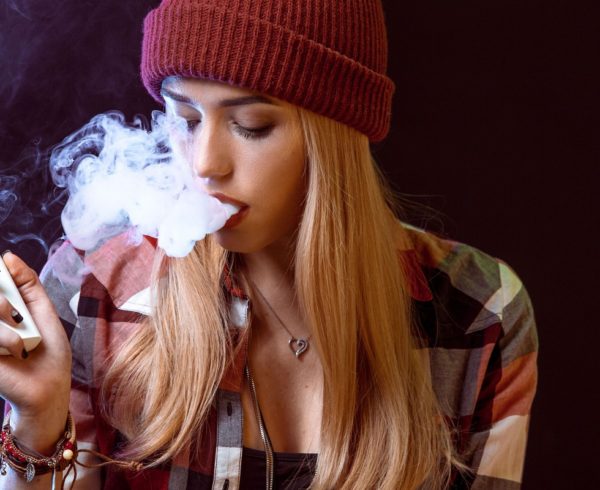 Image of a girl vaping