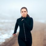 Tired runner in the snow