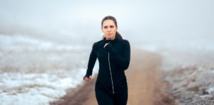 Tired runner in the snow