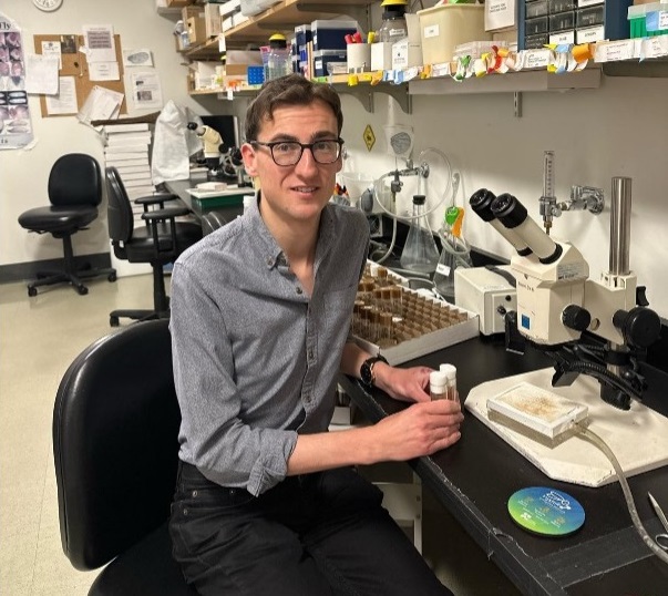 Alex Dyson in the fly room, where he studies fruit fly models of neurofibromatosis.