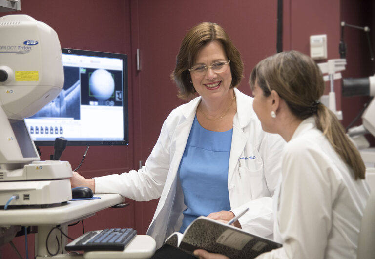 Joan W Miller MD, with Inês Laíns, MD, PhD,