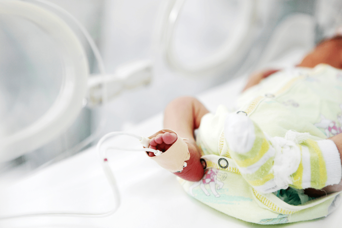An image of a premature infant receiving treatment in the NICU